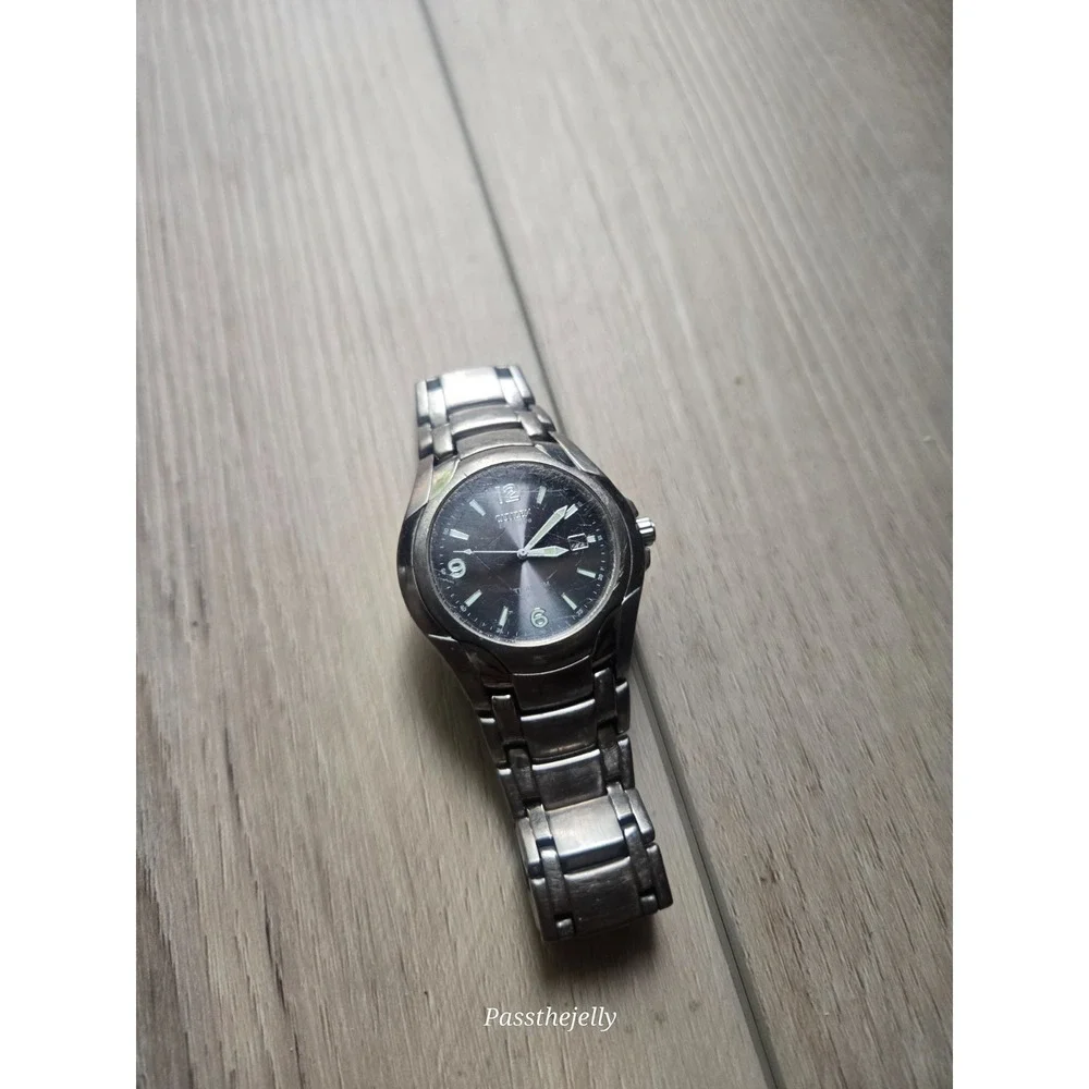 Citizen Watch Mens Eco-Drive Titanium WR100 Black Dial Date Bracelet Field Watch